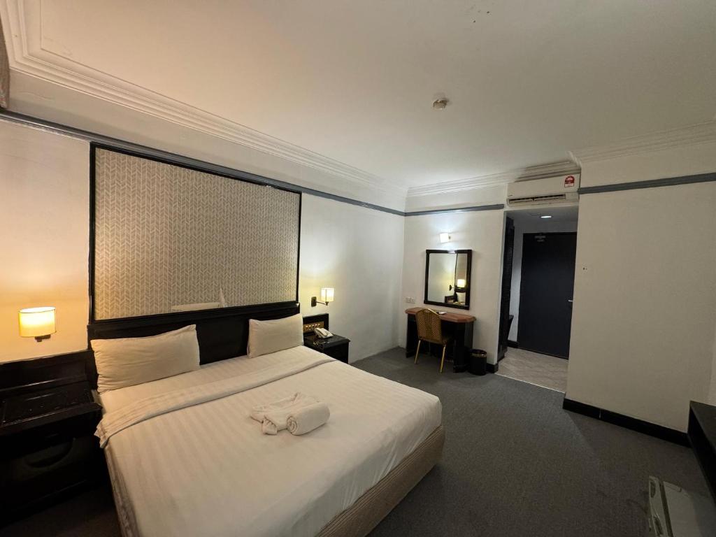 Postel nebo postele na pokoji v ubytování Hotel Deleeton