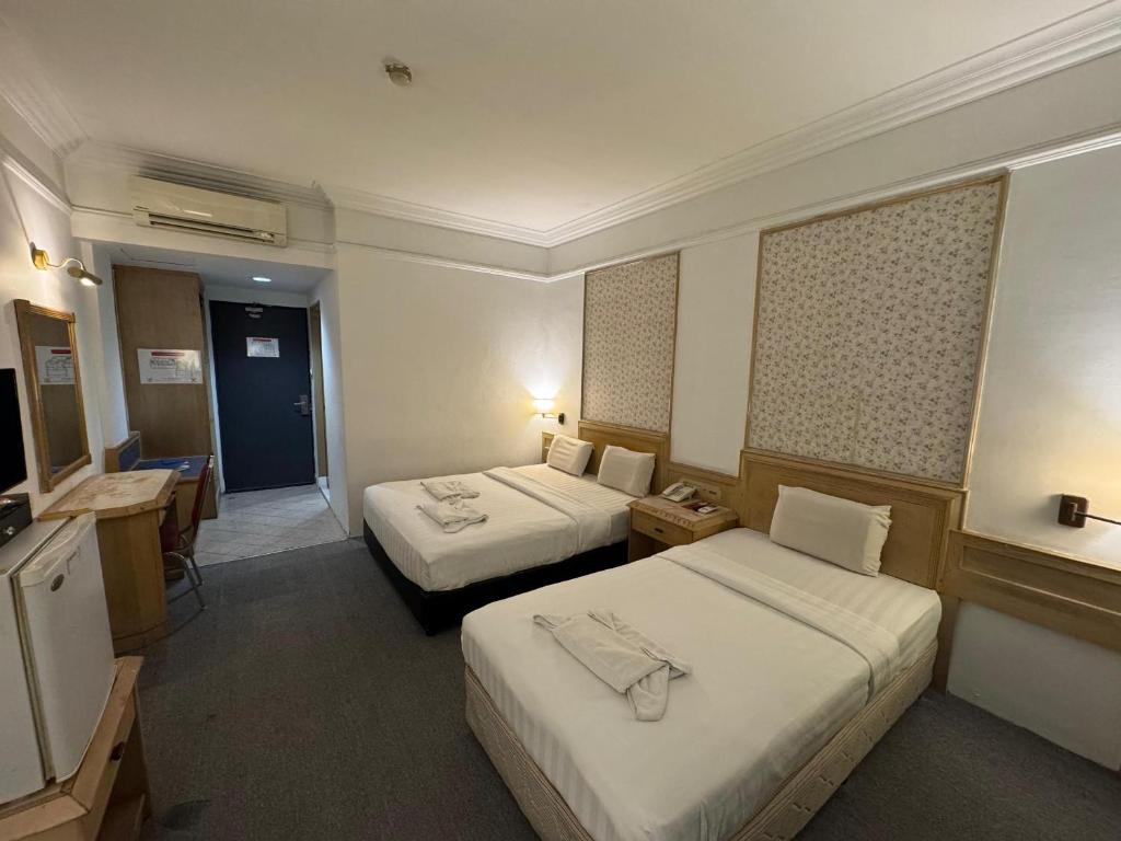 Postel nebo postele na pokoji v ubytování Hotel Deleeton