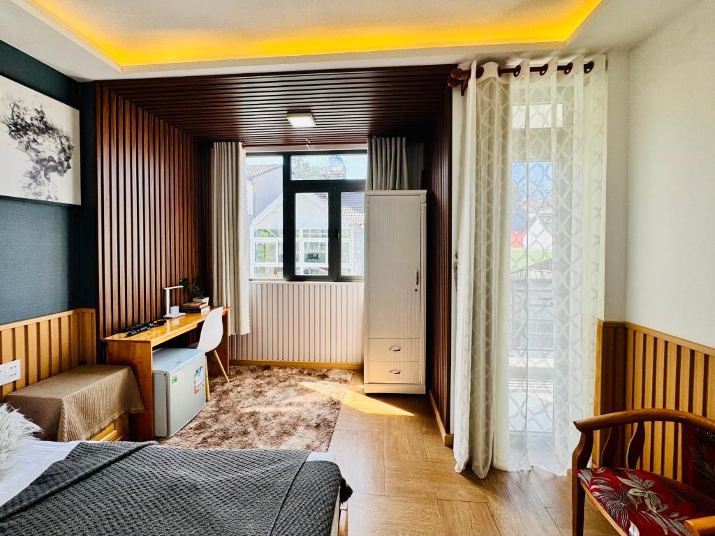 Giường trong phòng chung tại Dalat ECO Hotel 2