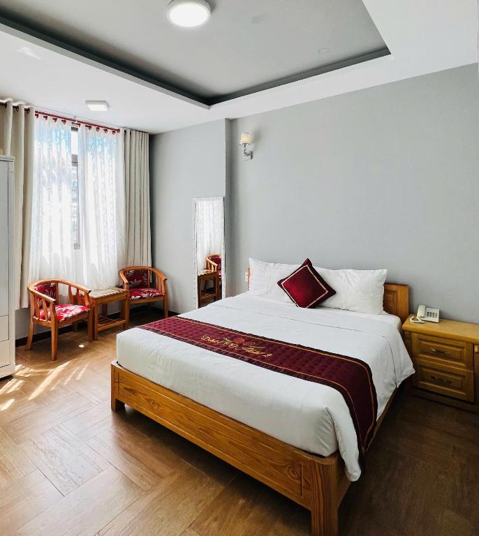 Giường trong phòng chung tại Dalat ECO Hotel 2