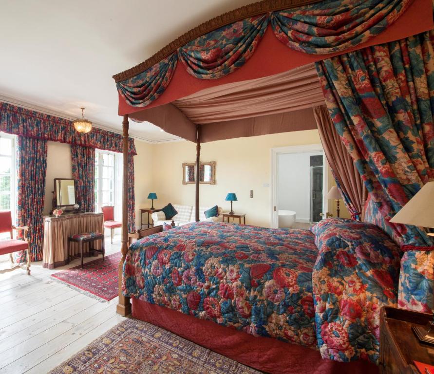 A bed or beds in a room at Prince Hill House