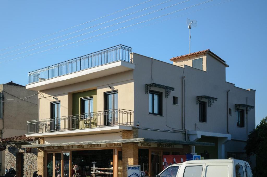 a building with a balcony on top of it at Ancient Tiryns in Nafplio