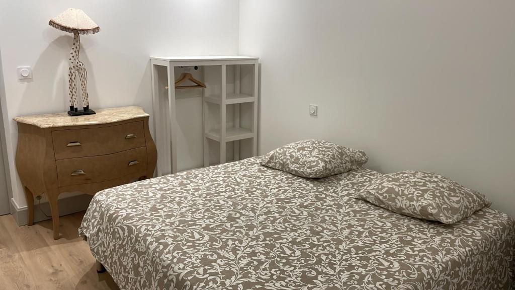 Postel nebo postele na pokoji v ubytování Gîte des falaises de champeaux