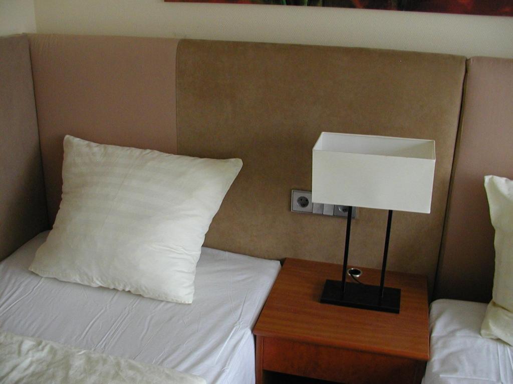 Postel nebo postele na pokoji v ubytování Motel Monteur