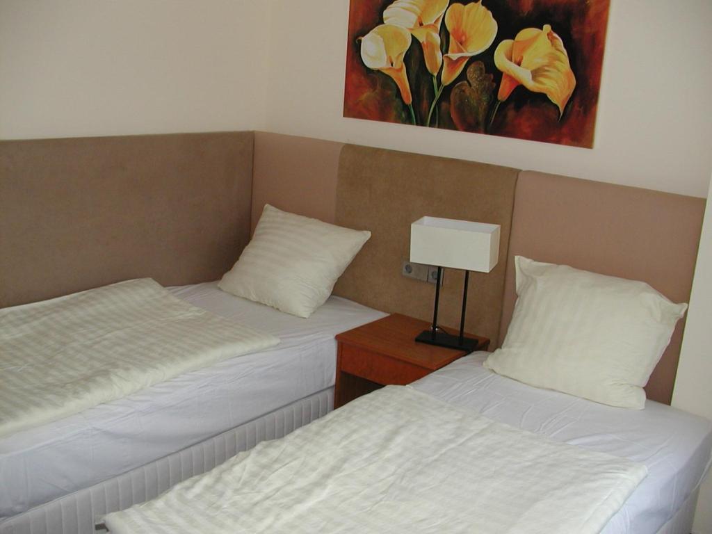 Postel nebo postele na pokoji v ubytování Motel Monteur