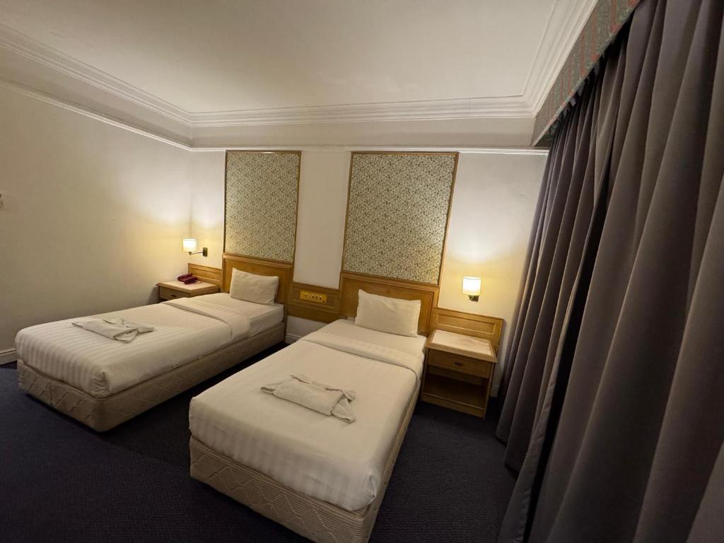 Postel nebo postele na pokoji v ubytování Hotel Deleeton