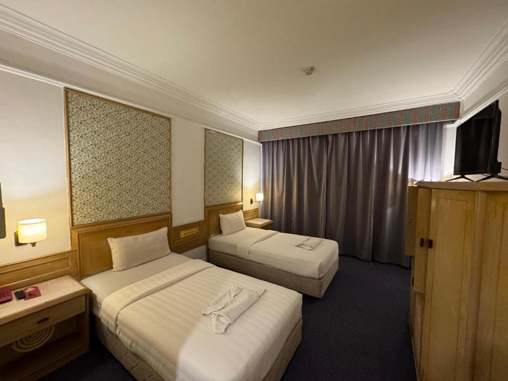 Postel nebo postele na pokoji v ubytování Hotel Deleeton
