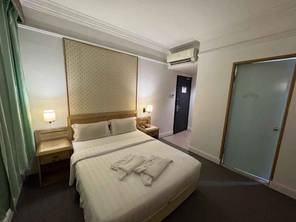 Postel nebo postele na pokoji v ubytování Hotel Deleeton