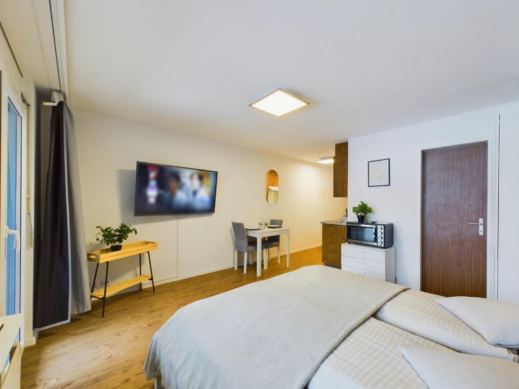 TV a/nebo společenská místnost v ubytování Panorama hideaway apartment near Zermatt with parking!