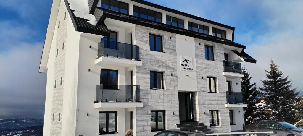 a building on top of a mountain at Fortuna Royal in Kopaonik