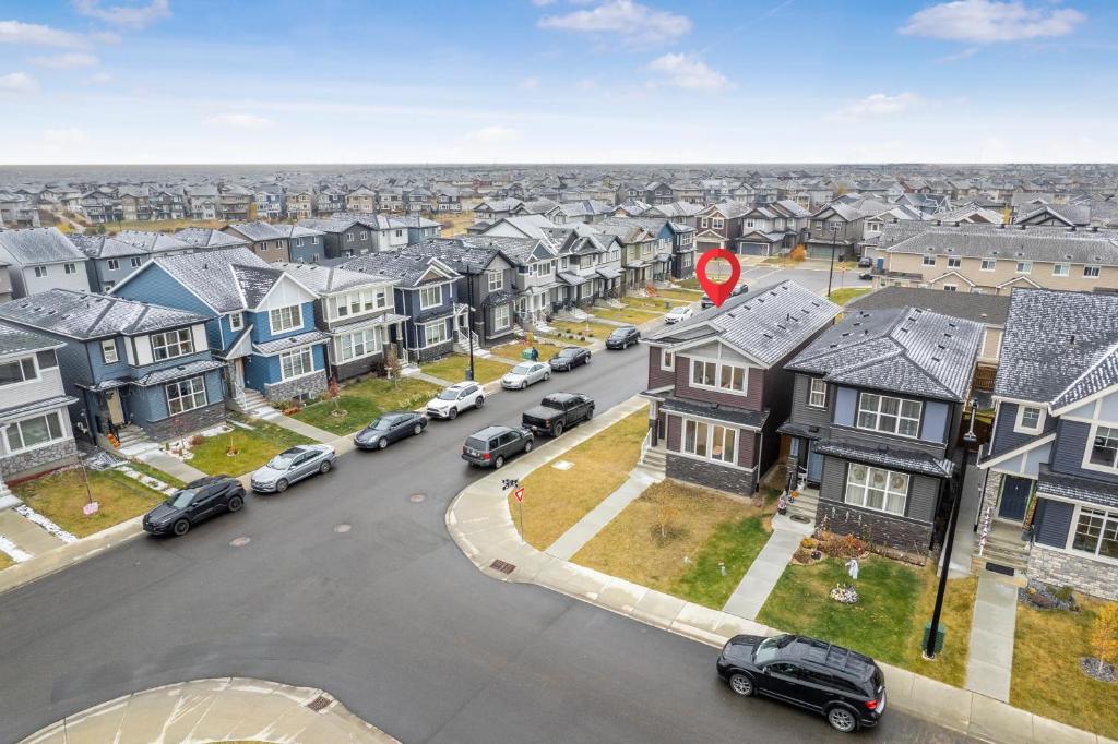 an aerial view of a residential neighborhood with parked cars at Private Master Bed Room SPRING in Edmonton