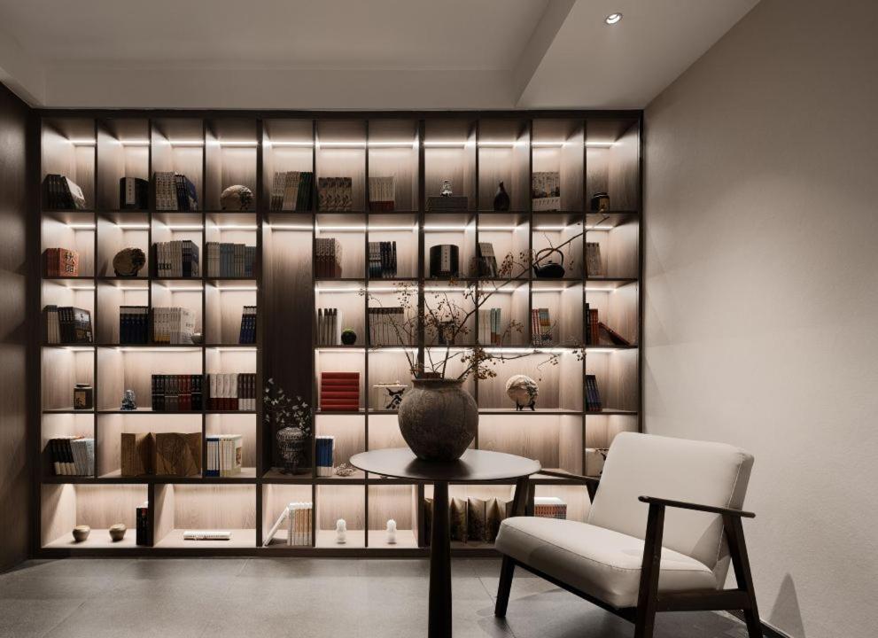 Posezení v ubytování Walling Hotel - Chongqing hongyadong jialingjiang binjianglu