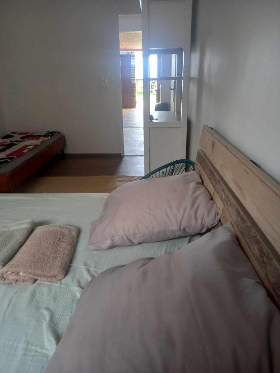 Postel nebo postele na pokoji v ubytování Lantana