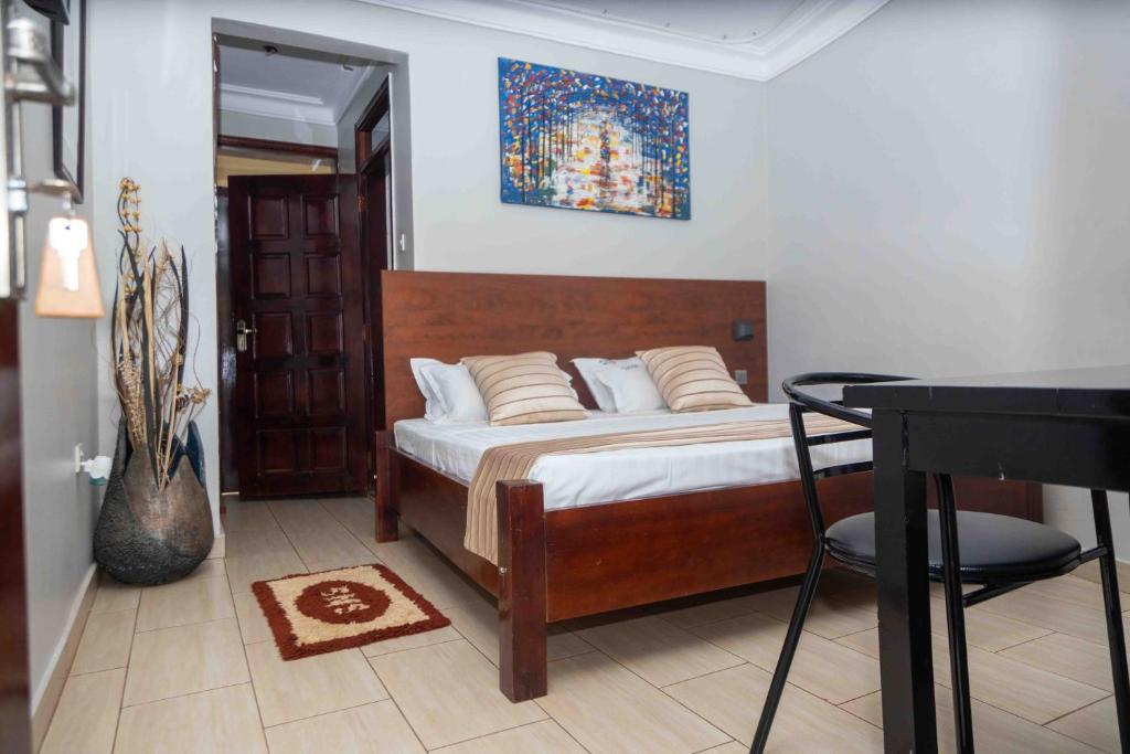 Posezení v ubytování Mirembe Hotels - Source of the Nile Suites