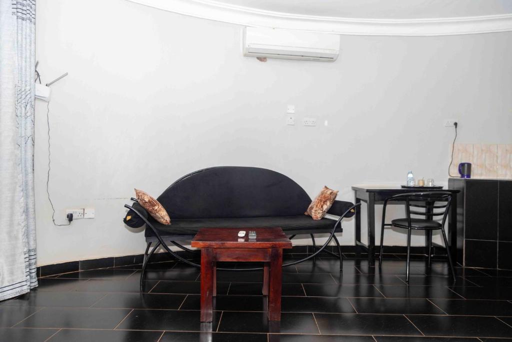 Posezení v ubytování Mirembe Hotels - Source of the Nile Suites