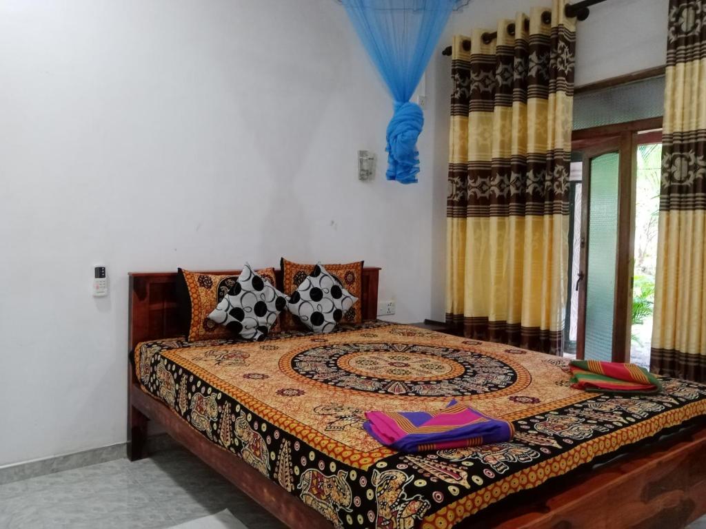 Postel nebo postele na pokoji v ubytování Horizon Resort & Hostel Sigiriya