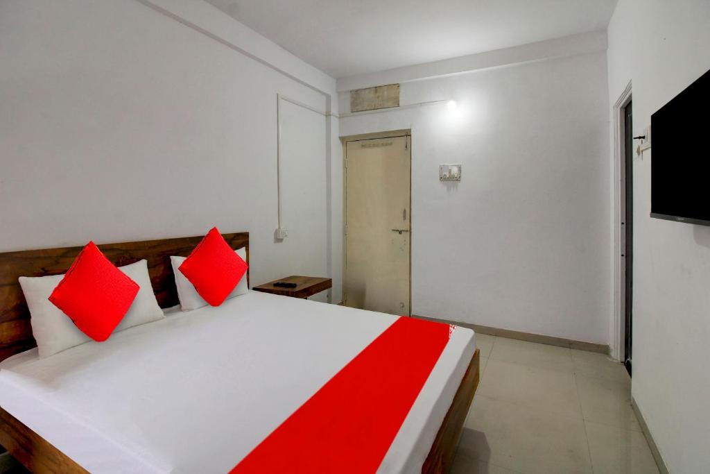 Postel nebo postele na pokoji v ubytování Super Hotel O The Golden Key