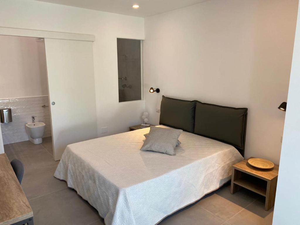 Postel nebo postele na pokoji v ubytování B&B direttamente sul mare da Antonino