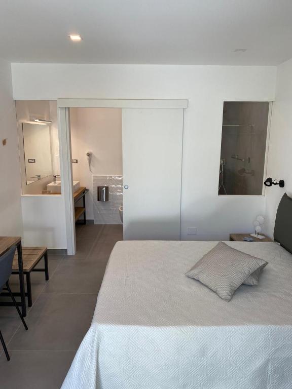 Postel nebo postele na pokoji v ubytování B&B direttamente sul mare da Antonino