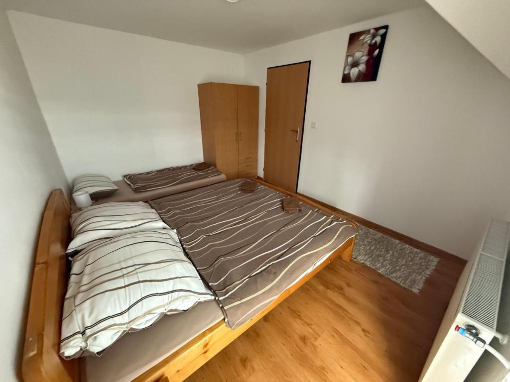 Postel nebo postele na pokoji v ubytování Ubytovanie u Lenky