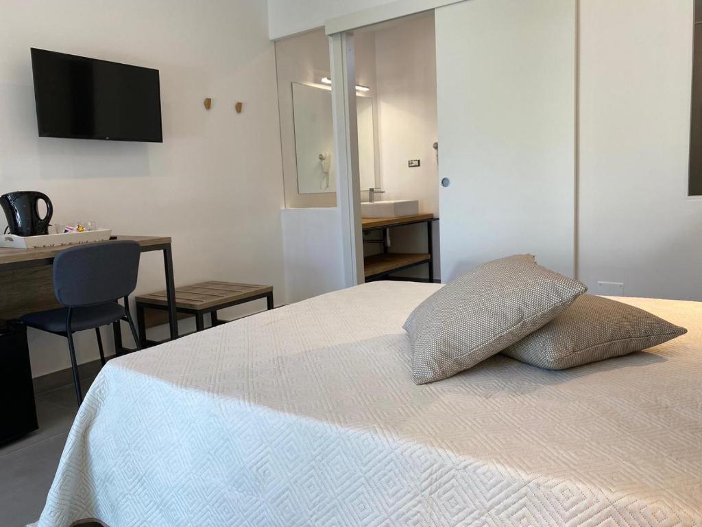 Postel nebo postele na pokoji v ubytování B&B direttamente sul mare da Antonino