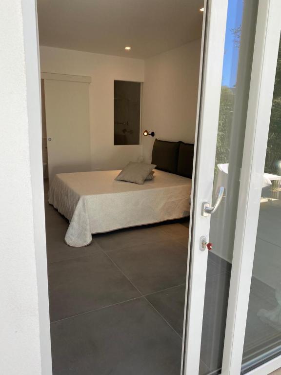 Postel nebo postele na pokoji v ubytování B&B direttamente sul mare da Antonino