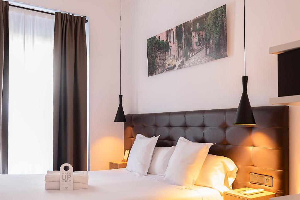 Postel nebo postele na pokoji v ubytování Woohoo Rooms Chueca
