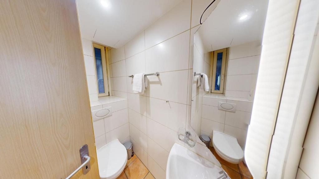 Koupelna v ubytování Zentral Altstadt Chur - Bahnhofsnah - Ferienwohnung - Bernina Express - Solution-Grischun