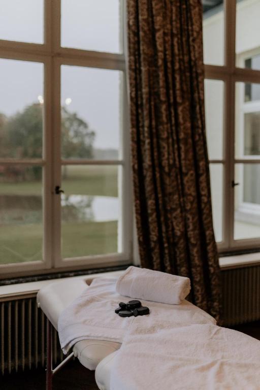 Postel nebo postele na pokoji v ubytování B&B Kasteel Den Tip