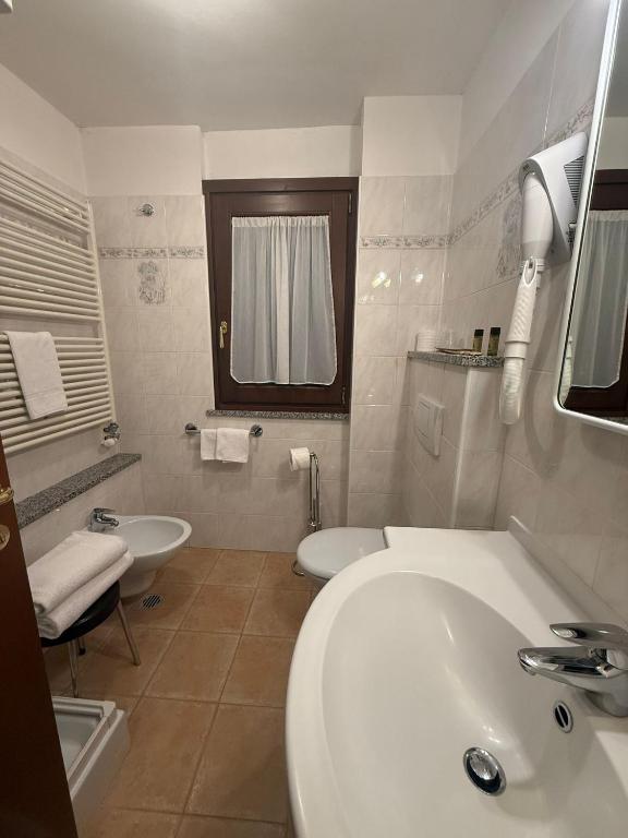 Koupelna v ubytování Hotel Breuil