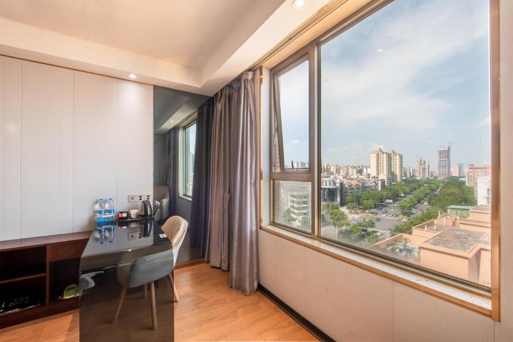 Fotografie z fotogalerie ubytování Calvin International Hotel Guangzhou Baiyun International Airport Huadu Plaza Branch - Free Deliver Service to Guangzhou Baiyun International Airport & Free Deliver Service to Canton Fair Complex During Canton Fair Period v destinaci Huadu