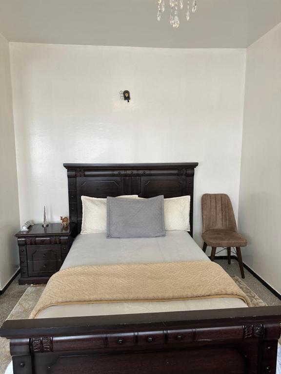 Ένα ή περισσότερα κρεβάτια σε δωμάτιο στο Emplacement idéal chambre Privée