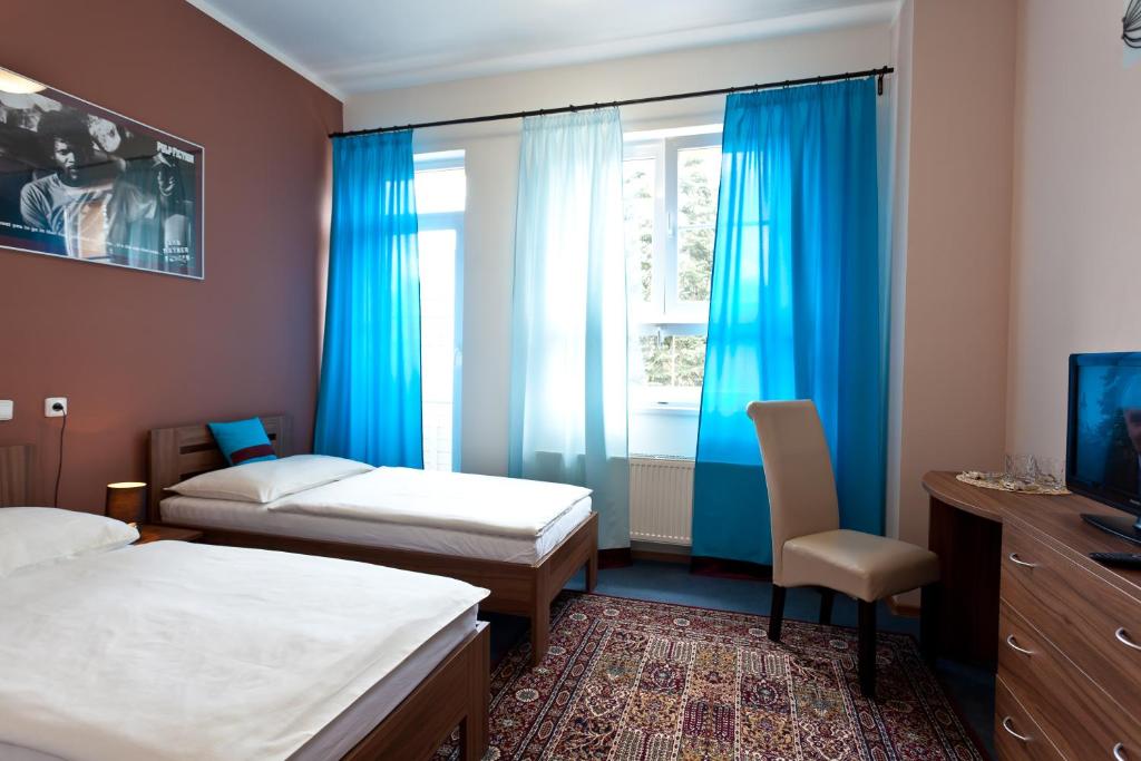 Postel nebo postele na pokoji v ubytování Sareza hotel