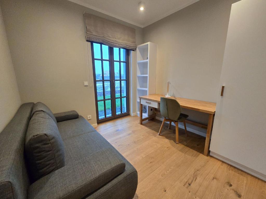 Posezení v ubytování Reetland am Meer - Luxus Reetdachvilla mit 3 Schlafzimmern, Sauna und Kamin H20