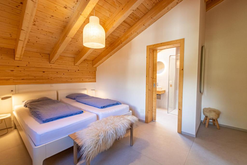 Postel nebo postele na pokoji v ubytování Luxury Penthouse Sonnenhof