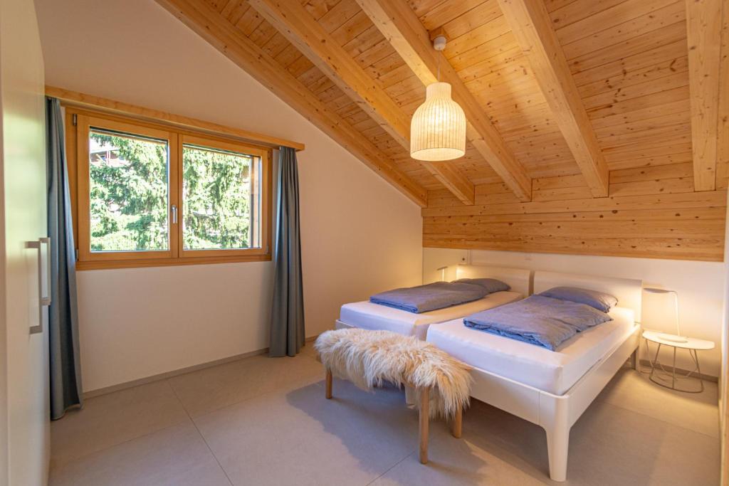 Postel nebo postele na pokoji v ubytování Luxury Penthouse Sonnenhof