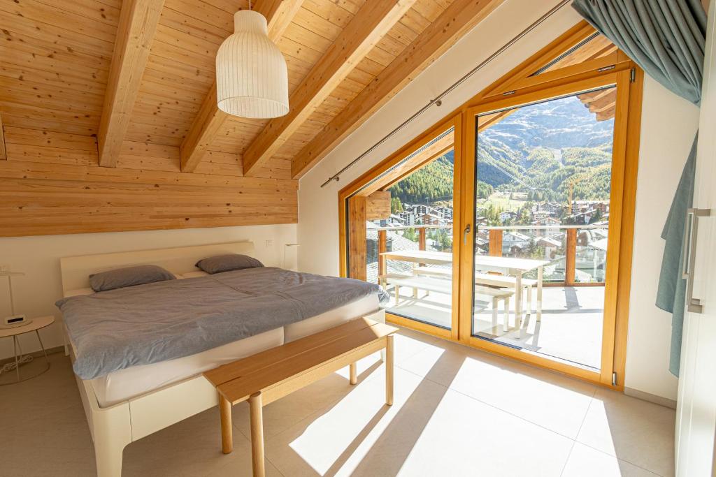 Postel nebo postele na pokoji v ubytování Luxury Penthouse Sonnenhof