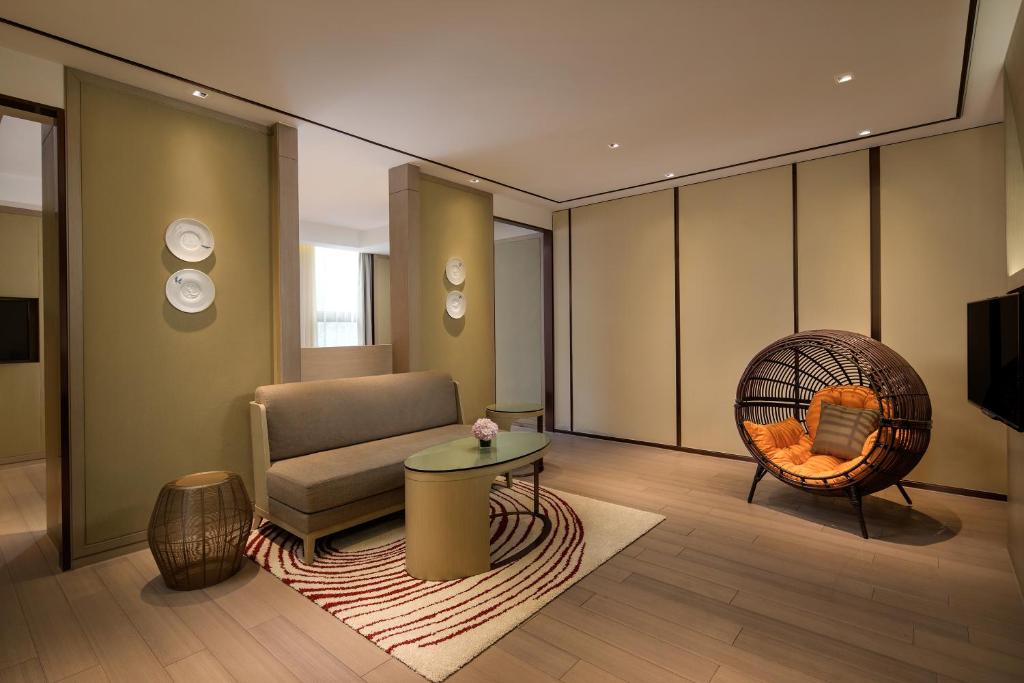 Posezení v ubytování Courtyard by Marriott Shanghai International Tourism and Resorts Zone