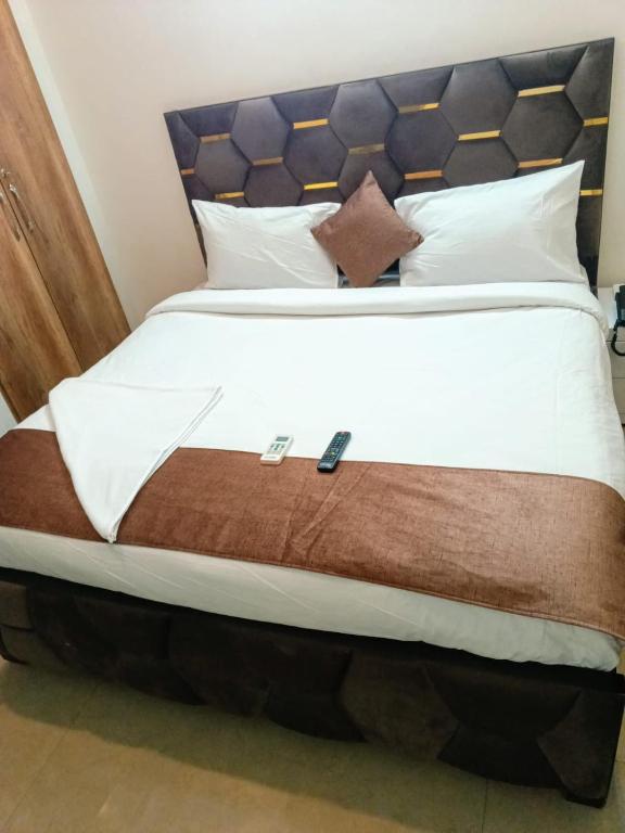 Letto o letti in una camera di Soooper Hotel