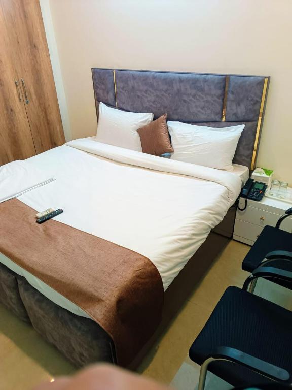 Letto o letti in una camera di Soooper Hotel
