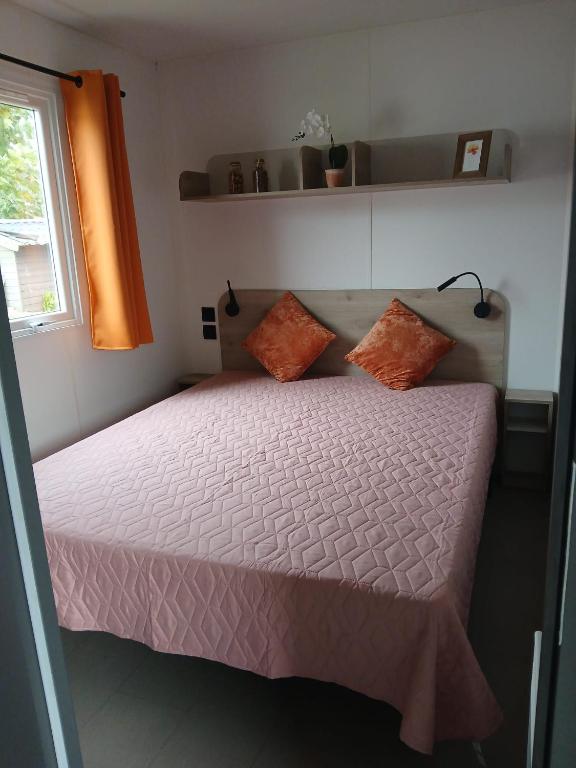 Postel nebo postele na pokoji v ubytování Holidaypark Klein Strand