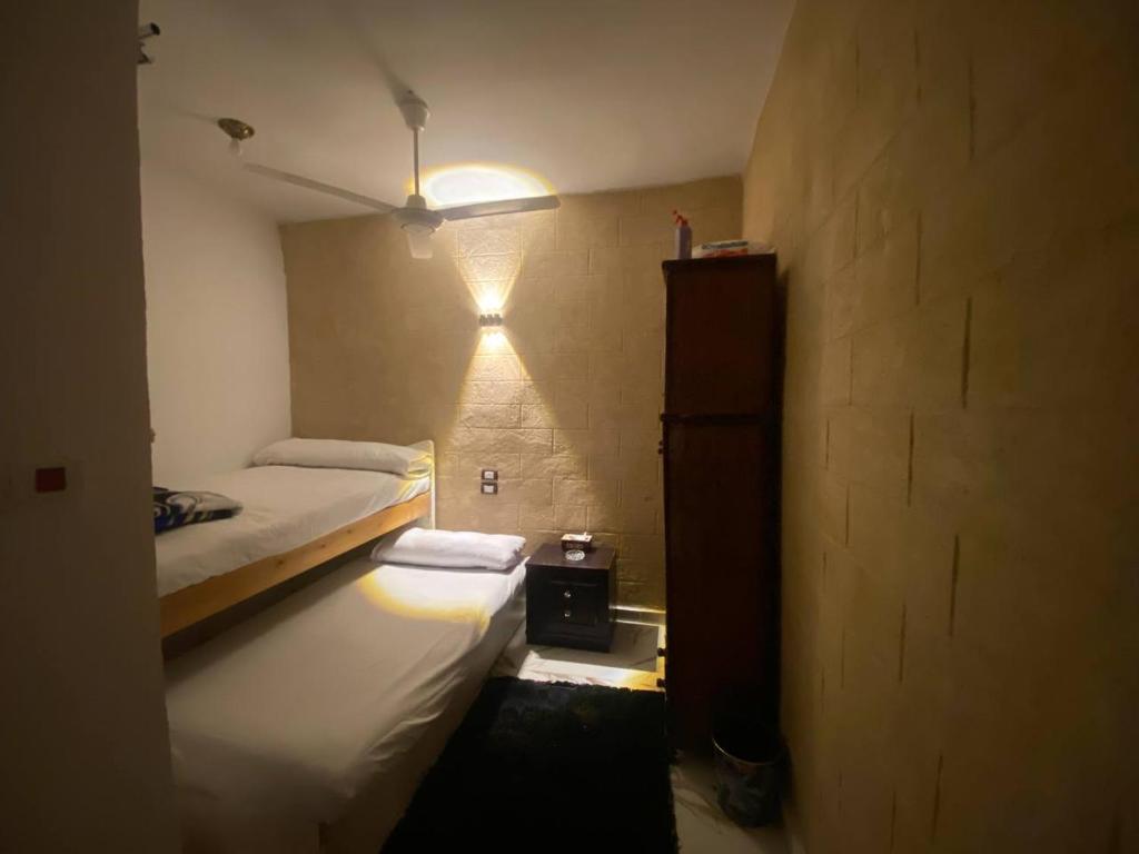 Postel nebo postele na pokoji v ubytování Bakar House