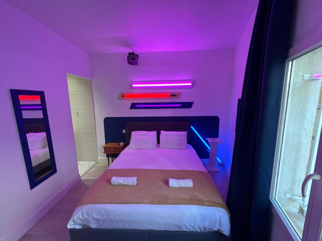 Posteľ alebo postele v izbe v ubytovaní Roma Reva: design et home cinema