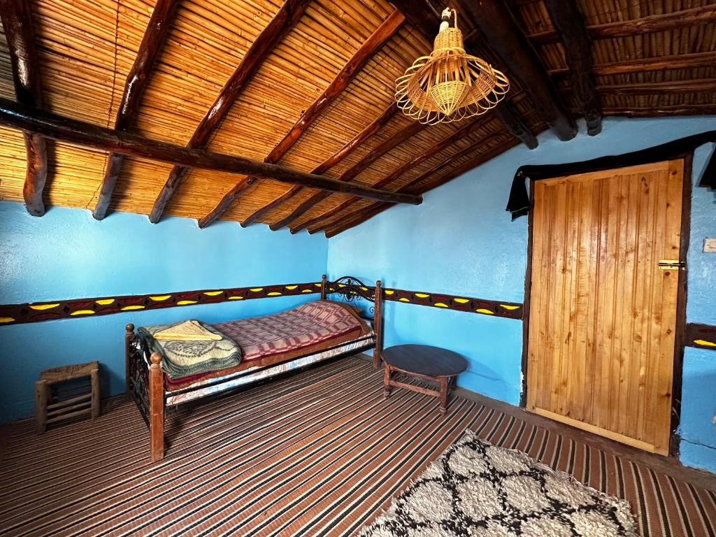 Letto o letti in una camera di Desert Tours & Camp Chraika