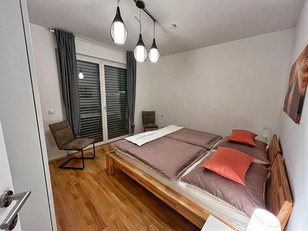 Postel nebo postele na pokoji v ubytování Hepp-Lounge
