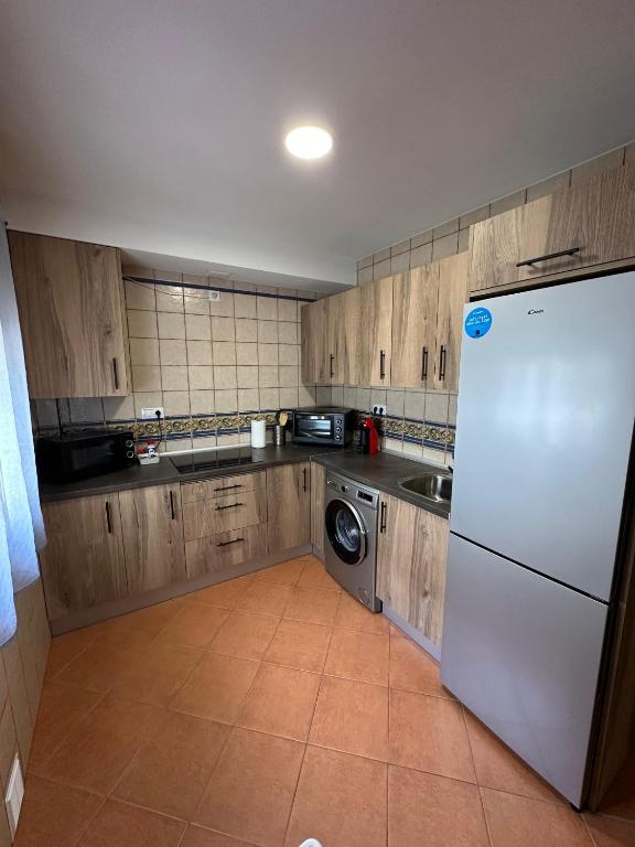 Kuchyňa alebo kuchynka v ubytovaní Duplex Arrebol