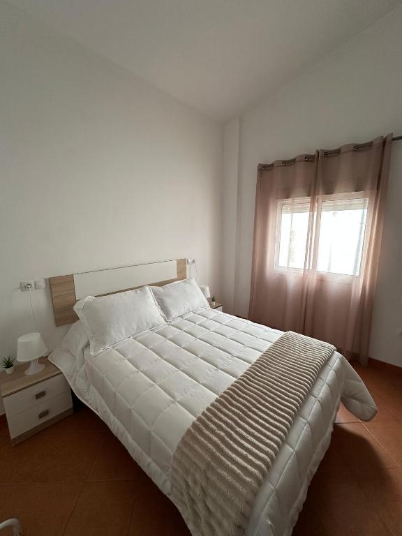 Posteľ alebo postele v izbe v ubytovaní Duplex Arrebol