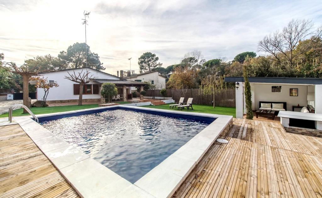 Bazén v ubytování HomeHolidaysRentals Confort nebo v jeho okolí