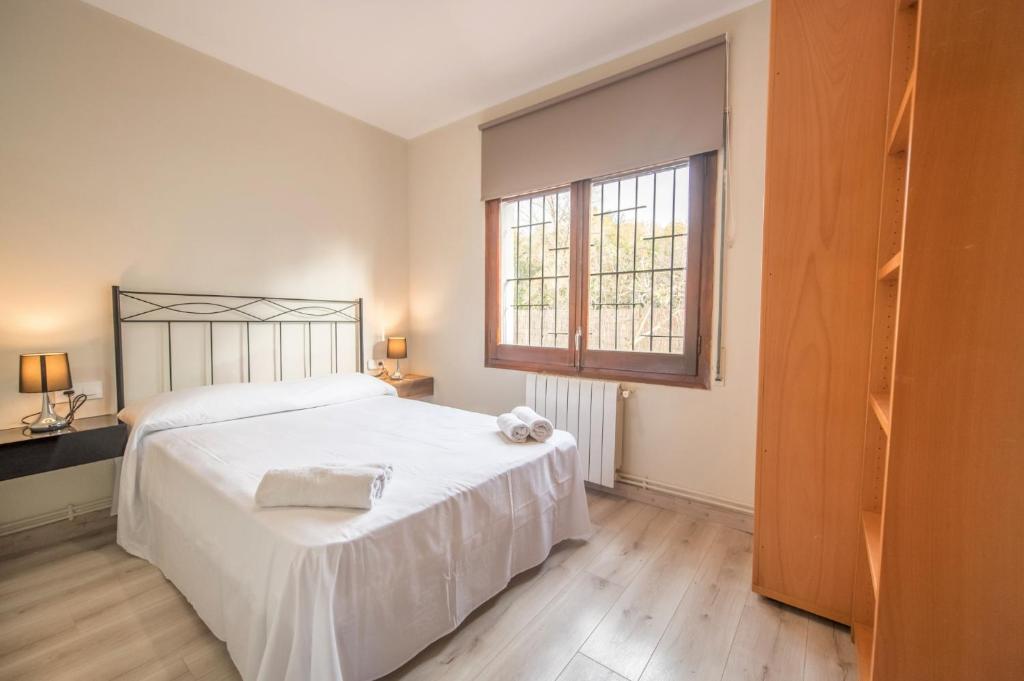 Postel nebo postele na pokoji v ubytování HomeHolidaysRentals Confort