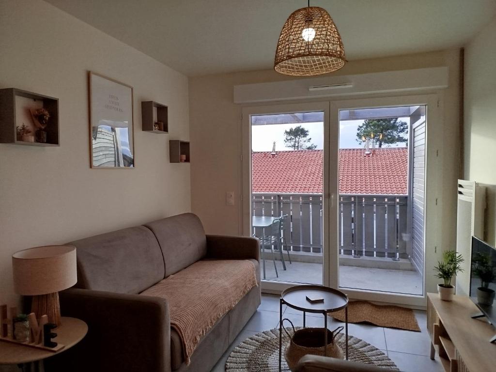 Χώρος καθιστικού στο La cabane Cosy ZEN des SABLES